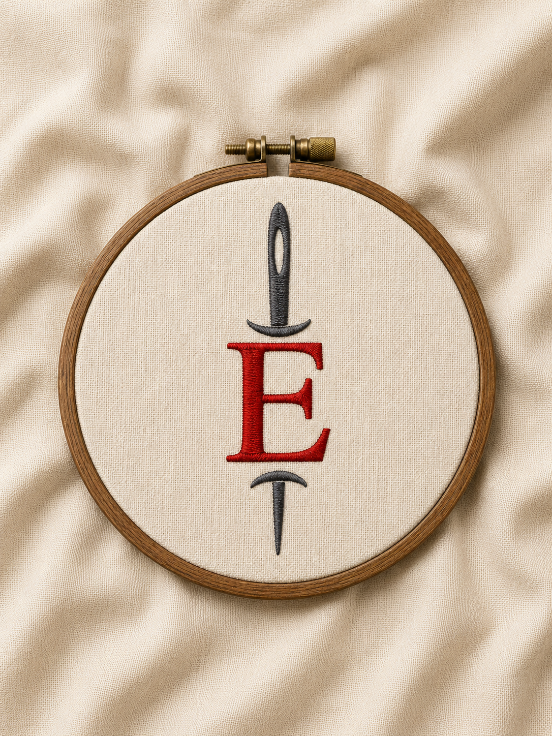 Embroiders logo stitched in an embroidery hoop